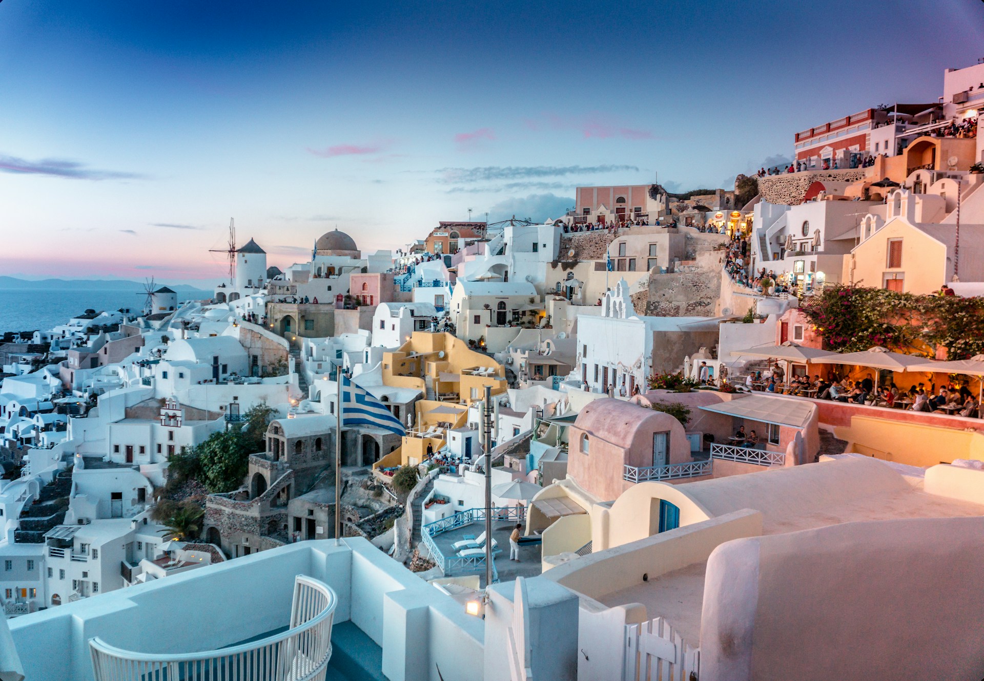 White rooftop view of an island city in Greece.