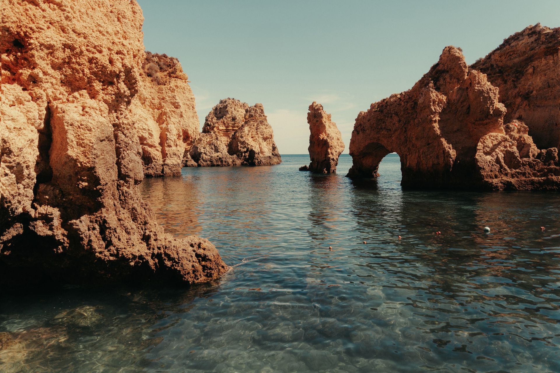Rock formations in Atlantic Ocean on the coast in Algarvae, Portugal.