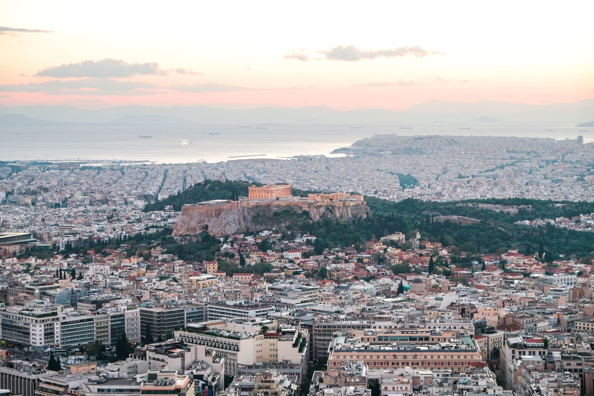 View of Athens, Greece with Acropolis towering over the city.