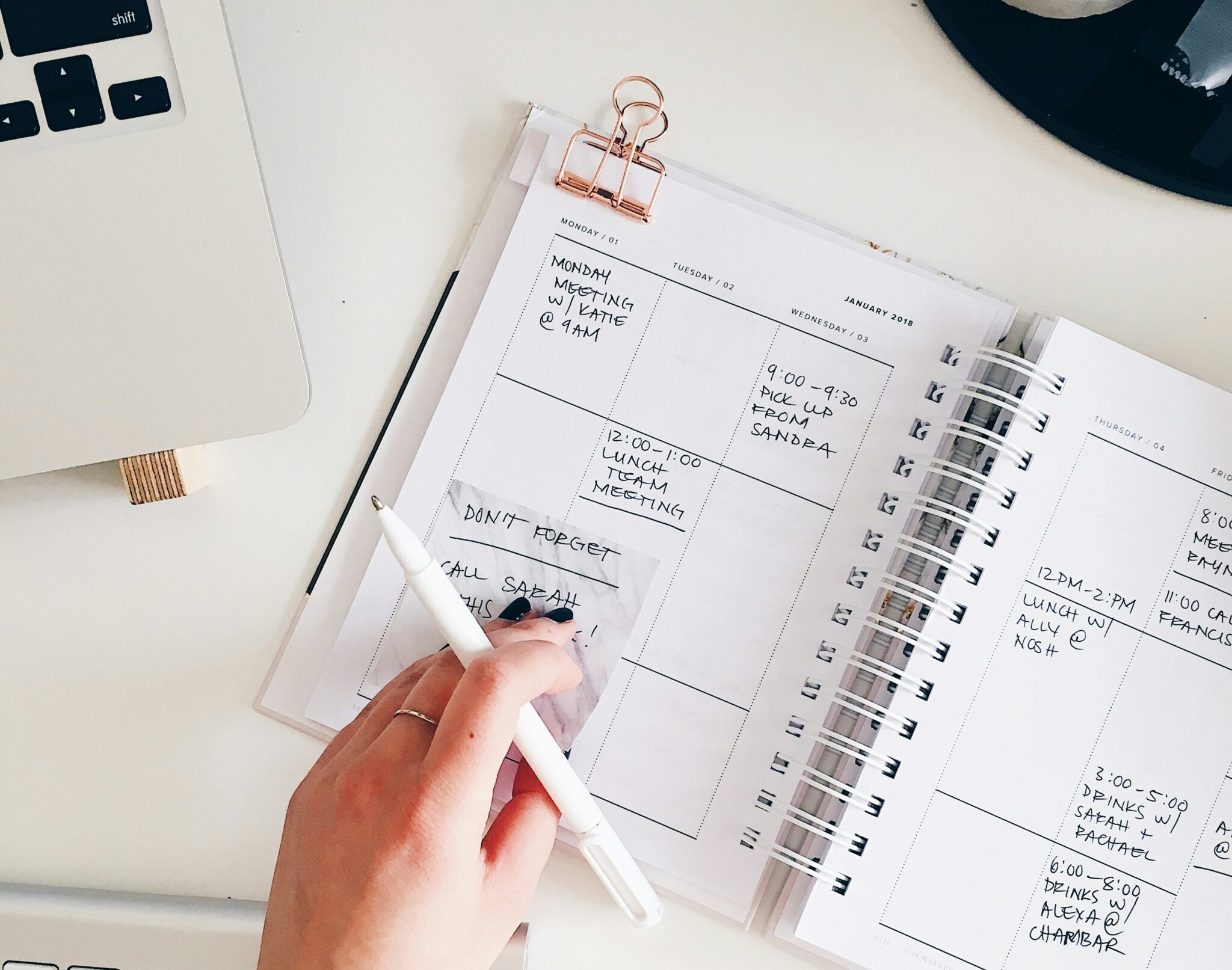 Planner making notes