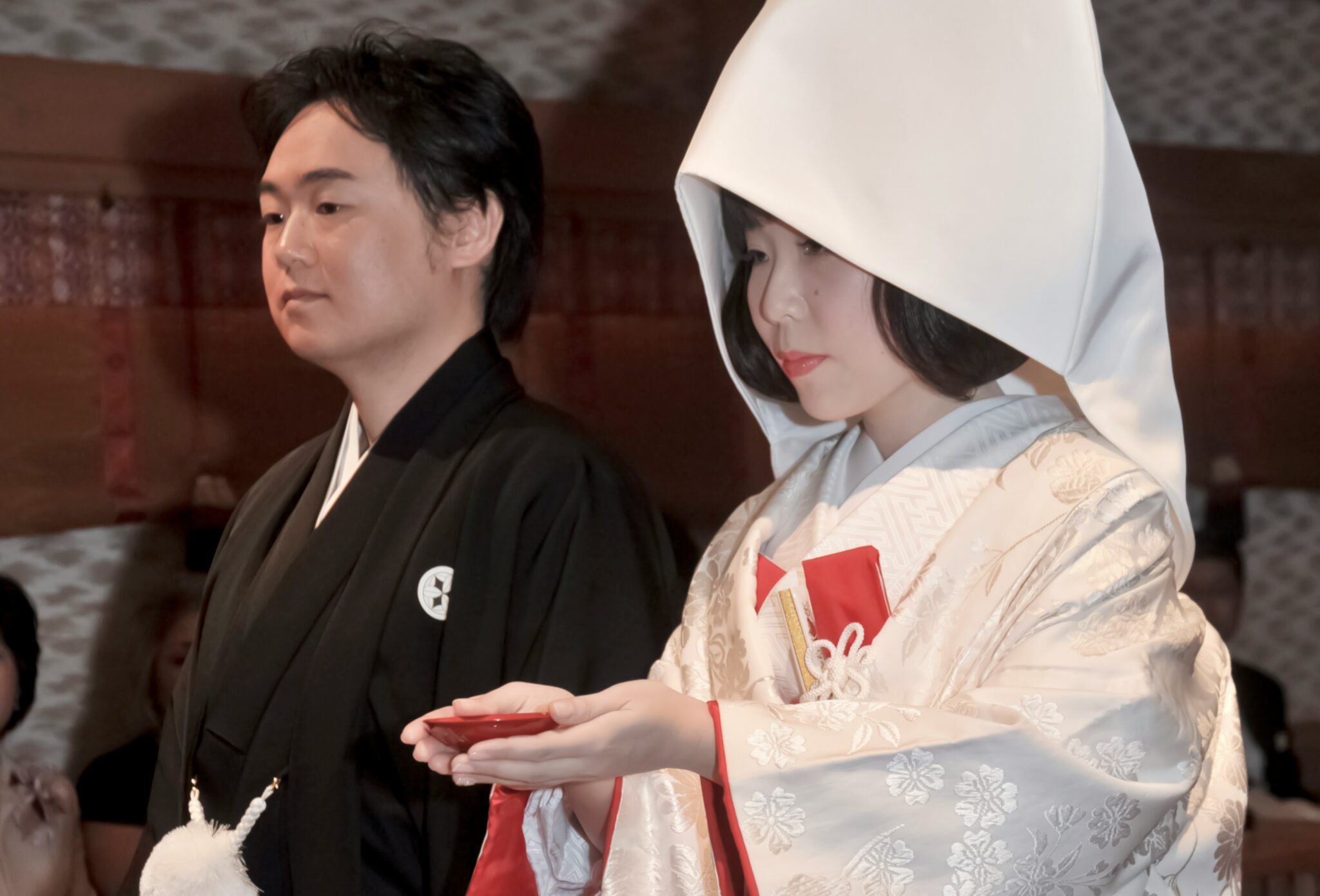 A couple drinking sake